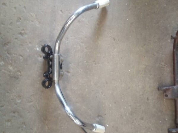 nk model, xlch 2 piece handlebars 52a bottom tree looks to be oem white harley davidson waffle grips, and ball bearing neck cups are included