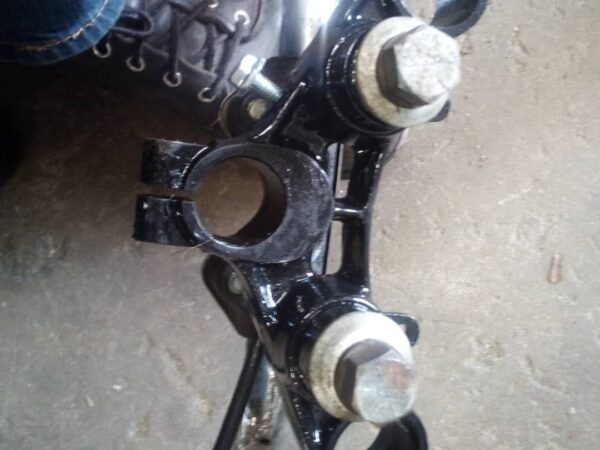 nk model, xlch 2 piece handlebars 52a bottom tree looks to be oem white harley davidson waffle grips, and ball bearing neck cups are included